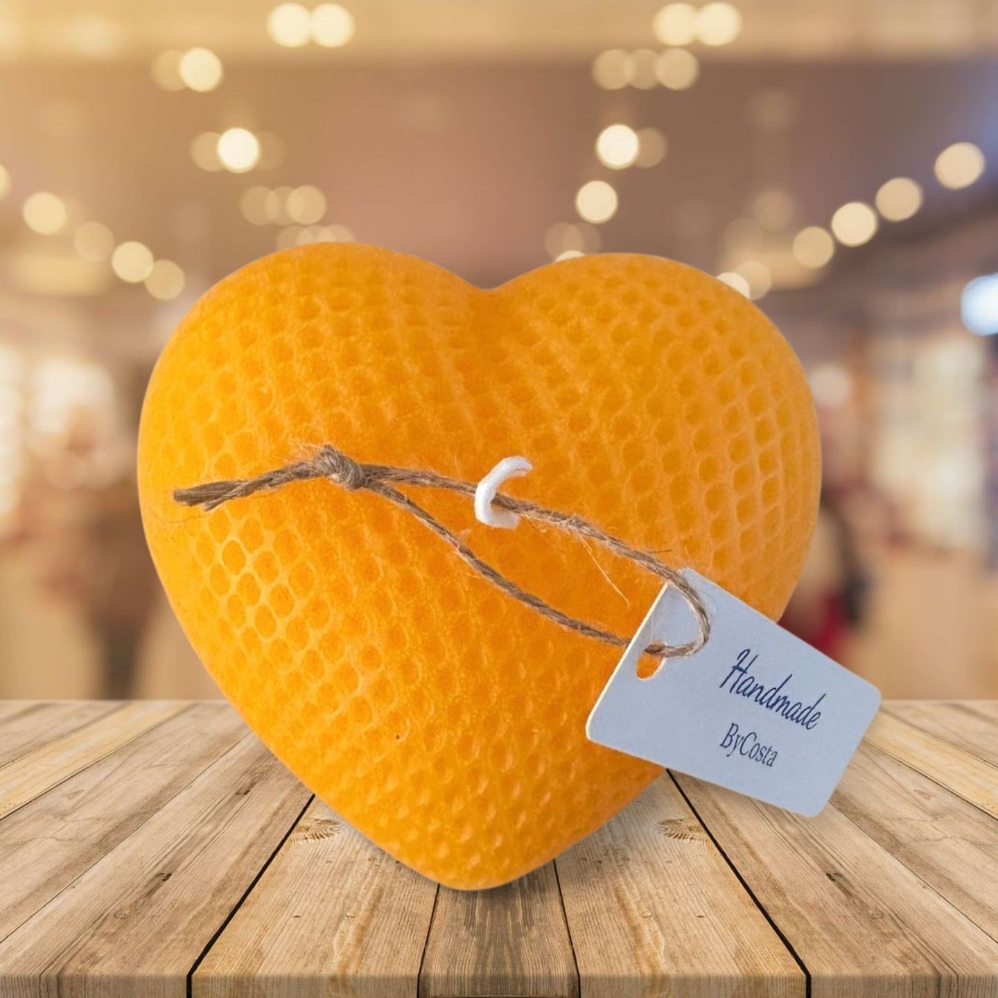 Handmade soy wax heart ornament in honey color